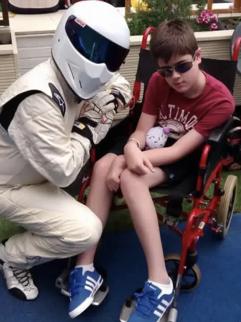 Young Liam with the Stig from Top Gear